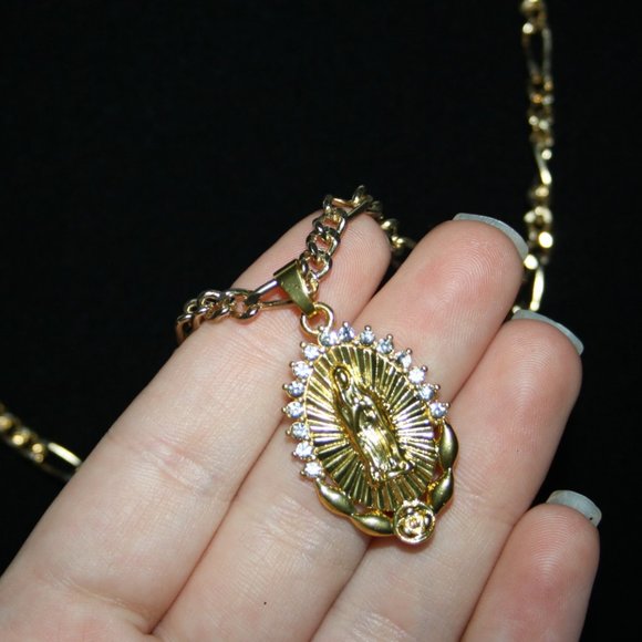 Beautiful gold chain necklace with Virgin Mary